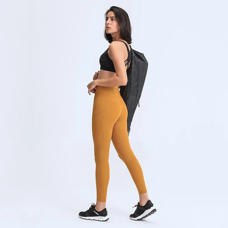 2025 New Yoga Pants, High Quality Women's Sports Bottom Pants with Side Pockets, and Gym Exercise Jogging Crop Pants