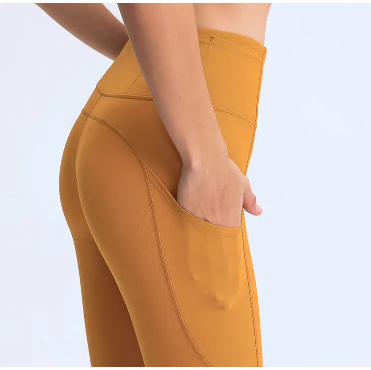 2025 New Yoga Pants, High Quality Women's Sports Bottom Pants with Side Pockets, and Gym Exercise Jogging Crop Pants